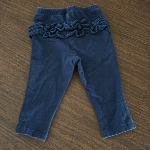 Set of 2 long sleeve bodysuits and 1 pair of Navy ruffle butt pants. - Picture 12 of 13